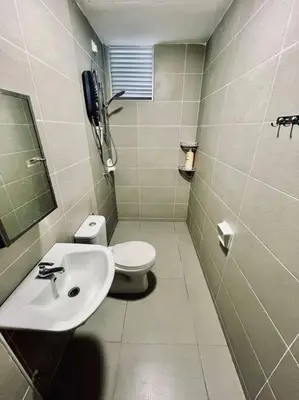 a bathroom with a toilet and a sink at 2BR LaPrimo Homestay Bandar Meru Raya Ipoh in Ipoh