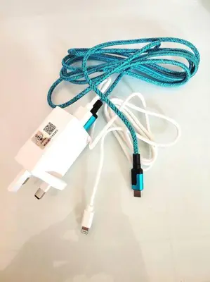 a green and white cable on a white table at PUTIH Ipoh SaltWater Pool BBQ 5Bed4Bath 19pax in Ipoh