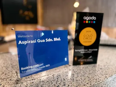 a bottle of argust glue satin fluid next to a box at Swing & Pillows - Armenian Victoria , Georgetown Penang in George Town
