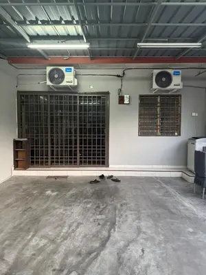an empty room with two speakers on the wall at Mom House in Ipoh