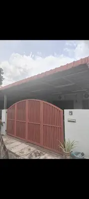 a red fence in front of a house at Mom House in Ipoh