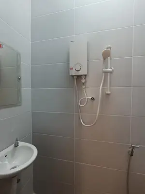 a bathroom with a shower and a sink at 9pax -Taman Bagan Butterworth -Budget Homestay in Butterworth