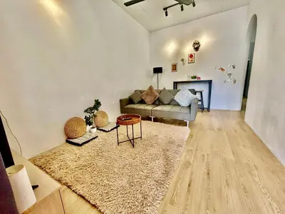 a living room with a couch and a table at Home95#4pax#BukitMertajam in Bukit Mertajam
