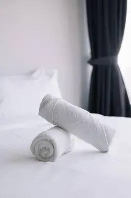 a roll of toilet paper sitting on a table at Seaview Tropicana218 3BR 2CP in George Town