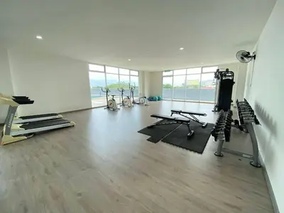 a gym with treadmills and exercise equipment in a building at feelslikehome Paloh Residence Ipoh-for 4 to 6pax in Ipoh