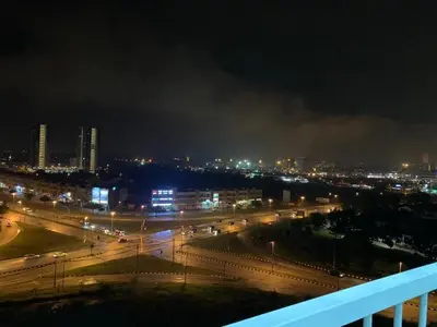 a view of a city at night with lights at The Rain Homestay Meru Raya in Ipoh