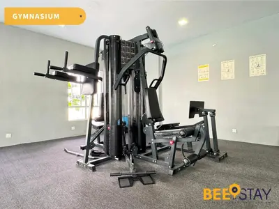 a gym with several tread machines in a room at Ipoh City Centre Manhattan Condo Pool View NEW Unit in Ipoh