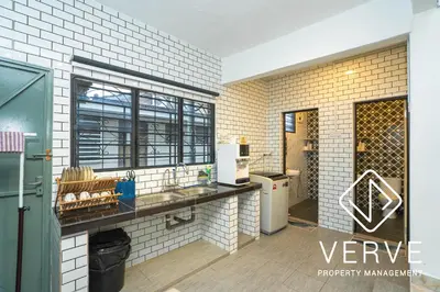 a kitchen with a counter and a sink in a room at Ipoh Hillview Boutique Guesthouse by Verve 10 pax in Ipoh