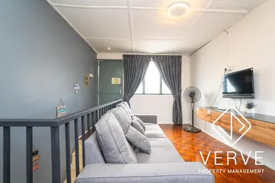 a living room with a couch and a tv at Ipoh Hillview Boutique Guesthouse by Verve 10 pax in Ipoh