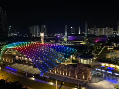 a large building with lights on it at night at Jambul Villa 3-storey corner House 6Bed5Bathroom in Bayan Lepas