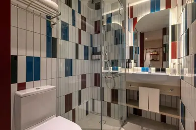 a bathroom with a toilet and a sink at lyf Georgetown Penang in George Town