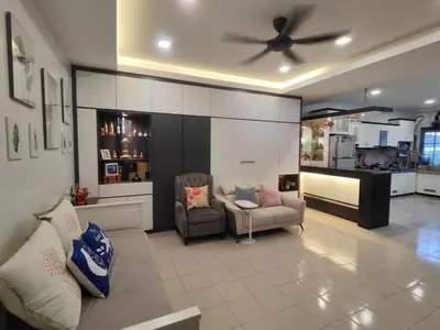 a living room with two chairs and a ceiling fan at Lenggong GEM 16 Homestay in Kampong Ulu Jepai