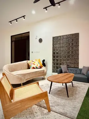 a living room with a couch and a table at New Grand Muji Style Villa at Central Penang 16pax in Bukit Lada