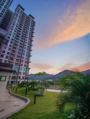 a large apartment building with a park in front of it at IPOH Apartmen Casa Kayangan Meru, Meru Raya 5 Ipoh Homestay in Ipoh