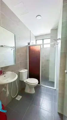 a bathroom with a toilet and a sink and a shower at IPOH Apartmen Casa Kayangan Meru, Meru Raya 5 Ipoh Homestay in Ipoh