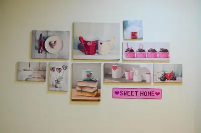 a collage of pictures of utensils on a wall at Ting Residence in Sitiawan