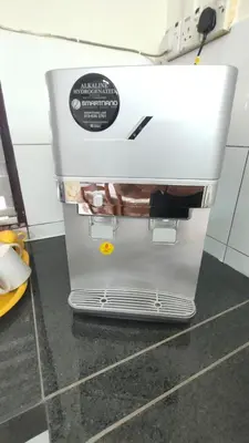 a coffee maker sitting on a counter in a kitchen at 77 homestay 5Min to Leaning Tower in Teluk Intan