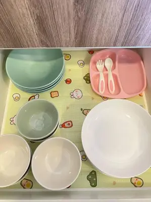 a group of plates and utensils on a table at G Home 1 - Ipoh City Center Majestic 2R2B in Ipoh