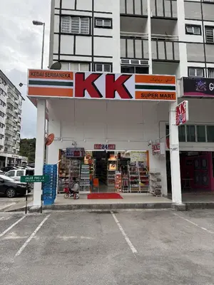a kx gas station in front of a building at AYAAN DELUXE HOMESTAY FREE WiFi in Cameron Highlands