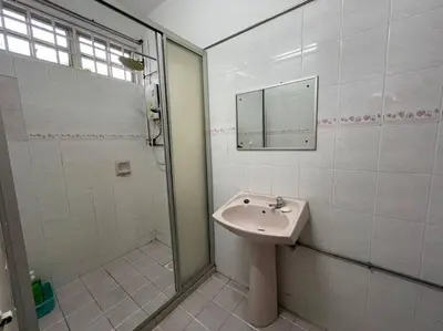 a white bathroom with a sink and a shower at 4BR 2Storey Terrace Homestay at Bukit Jambul by SK Vacation Homes in Bayan Lepas