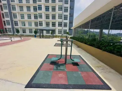 a table in front of a large building at The Anderson Haven Family Suites - Ipoh 2-bedroom Apartment in Ipoh