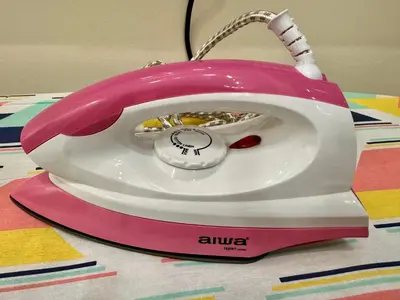 a pink and white toaster sitting on a table at Premium world-class House-Sea & City View Netflix in Jelutong