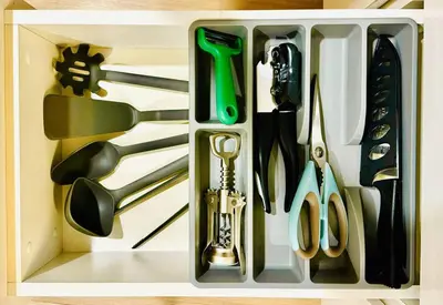 a plastic container filled with utensils in a drawer at Georgetown Seaview 5 Min To Gurney N Straits Quay Washing Machine N Dryer in Tanjong Tokong