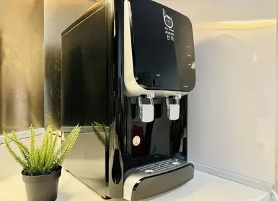 a coffee machine sitting on top of a counter at Georgetown Seaview 5 Min To Gurney N Straits Quay Washing Machine N Dryer in Tanjong Tokong
