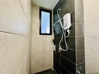 a shower in a bathroom with a window at The Best Luxury suites Asia Spacious 3BR Sea View in Jelutong