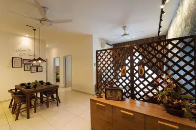 a living room with a table and a dining room at Horizon Ipoh 8Pax 3R2B - Tropical Bali Retreat in Ipoh