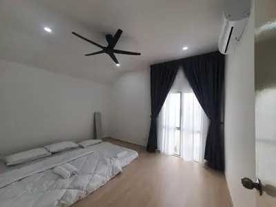 a bedroom with a bed and a ceiling fan at 3Story Family Suites 7pax Ikea Batu Kawan 5min in Batu Kawan