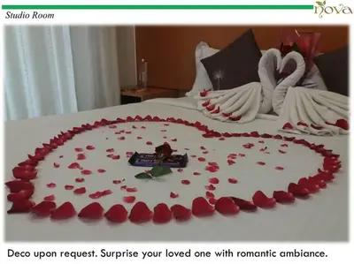 a bed with a heart made out of red roses at Cameron Nova Highlands Resorts II in Brinchang