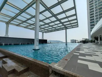 a pool on the roof of a building at Southbay Seaview Condo A2 10minQueensbay 10minSpice in Bayan Lepas