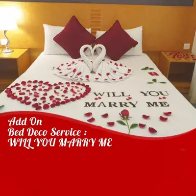 a bed with a heart made out of red roses at Cameron Nova Highlands Resorts in Brinchang
