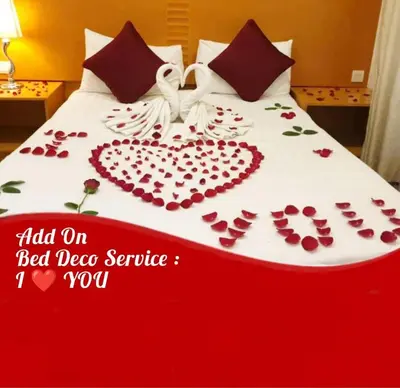 a bed with a heart made out of red roses at Cameron Nova Highlands Resorts III in Brinchang