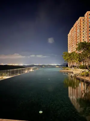 a large body of water next to some buildings at Georgetown Urban Family & Baby-Friendly Home with Skypool Seaview in Jelutong
