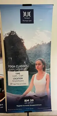 a poster of a woman in yoga classes new spirituality at Ipoh Lakeside Apartment with Mountain View in Kampong Batu Lapan