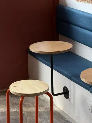 two tables and two stools in a room at Aayu Seckchuan - 3 mins walk to Love Lane in George Town