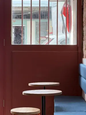 two tables sitting in front of a window at Aayu Seckchuan - 3 mins walk to Love Lane in George Town