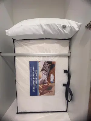 a book sitting on top of a bunk bed at City View & Sea View Mansion One Gleneagles Gurney Komtar George Town by Cozy Cottage Haven in George Town