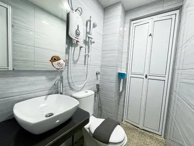 a bathroom with a sink and a toilet and a shower at IPOH Sky Garden Residences, 31200 Chemor Ipoh in Chemor