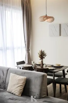 a living room with a couch and a table at Sky High Stuning Penang Bridge & City Views 3BR in Jelutong