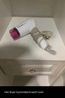 a hair dryer on the ceiling of a room at 1Pax-2Pax Single Room in Bukit Mertajam Alma Impian in Juru
