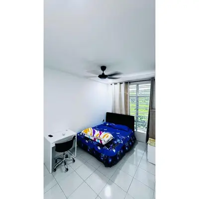 a bedroom with a bed and a desk and a window at Ipoh Anderson Khan Residence by Khan in Ipoh