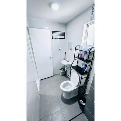 a bathroom with a toilet and a sink at Ipoh Anderson Khan Residence by Khan in Ipoh
