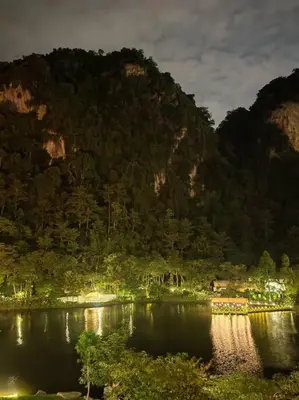 a large body of water in front of a mountain at Magnificent Mountain & Lake Views' Suite Cycas in Kampong Batu Lapan
