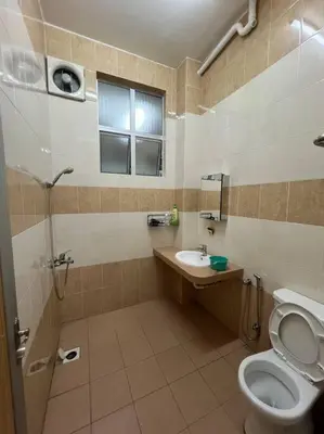 a bathroom with a shower and a toilet and a sink at Family choice Ling53 in Sitiawan
