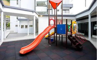a playground in a building with a slide at Serene Zen Family Retreat 2 to 7pax&Sunrise View in Brinchang