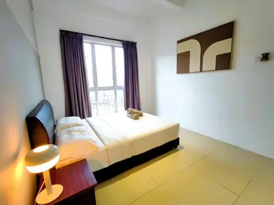 a bedroom with a bed and a large window at Somer GoldenHills Cameron Highlands Free Wi-Fi in Brinchang