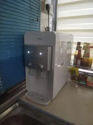 a coffee maker sitting on top of a counter at Seadanya Homestay Kamunting in Kampong Melayu Changkat Larah